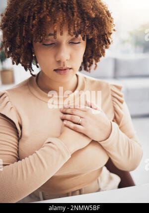 Black woman, breathing exercise and stress mindfulness of a remote worker doing meditation. Breathe, heart rate awareness and meditating young female Stock Photo
