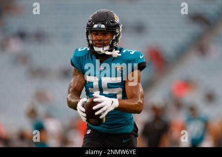 August 24, 2017: Jacksonville Jaguars wide receiver Justin Blackmon (14)  escapes Carolina Panthers cornerback Cole Luke (32) during a punt return in  the second half of an NFL preseason game in Jacksonville