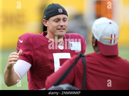 Washington Commanders punter Tress Way (5) punts the ball during an NFL  football practice at FedEx Field, Saturday, Aug. 6, 2022, in Landover, Md.  (AP Photo/Alex Brandon Stock Photo - Alamy