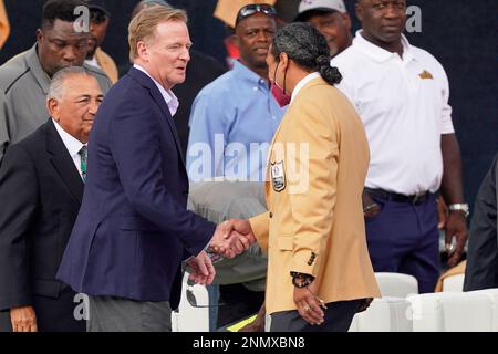 NFL commissioner Roger Goodell congratulates Los Angeles Rams quarterback Matthew  Stafford (9), defensive end Aaron Donald (99), and offensive tackle Andrew  Whitworth (77) after the NFL Super Bowl 56 football game against