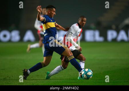 Nicolas De La Cruz of River Plate, left, looks as Walter Bou of Velez  Sarsfield heads the ball during a Copa Libertadores round of sixteen,  second leg soccer match at Monumental stadium