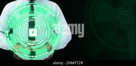 Businessman holding tablet with two hands. Glow going from device presenting important information. Futuristic digital design showing technological Stock Photo