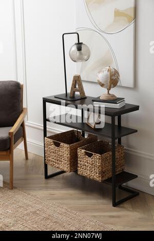 Hallway with stylish console table and armchair. Interior design Stock ...