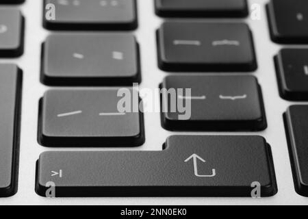 Closeup view of Enter key on modern computer keyboard Stock Photo