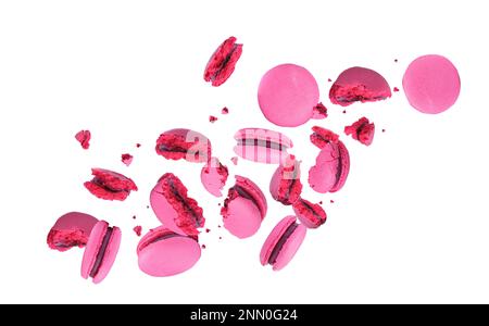 Sweet delicious macarons flying on white background Stock Photo