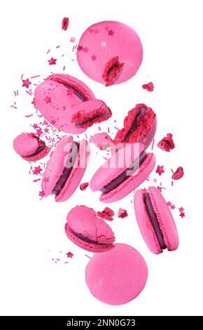 Sweet delicious macarons flying on white background Stock Photo