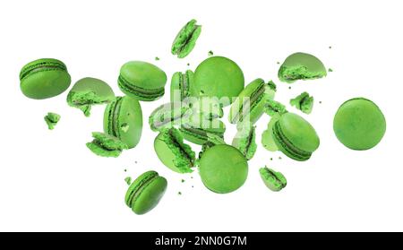 Sweet delicious macarons flying on white background Stock Photo