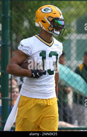 ASHWAUBENON, WI - AUGUST 05: Green Bay Packers wide receiver Allen Lazard  (13) grabs his helmet during Green Bay Packers Family Night at Lambeau  Field, on August 5, 2022 in Green Bay