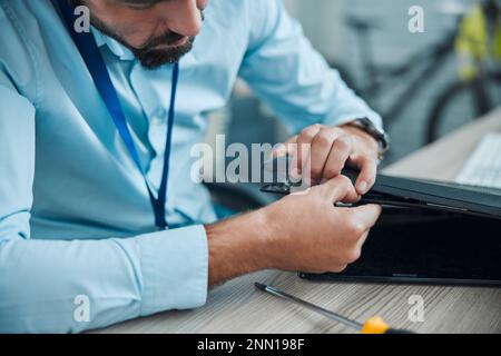 Computer repair, programming and startup man technician working on cpu, circuit and microchip. IT maintenance, technology hardware and electrician Stock Photo