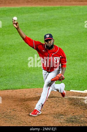 BALTIMORE, MD - JULY 23 Washington Nationals catcher Tres Barrera (38)  looks back to the dugout as Baltimore Orioles center fielder Cedric Mullins  (31) comes to bat during the Washington Nationals game