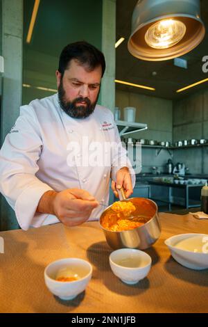 Chef Diogo Rocha preparing food at Michelin Star restaurant Mesa de Lemos in Silgueiros, Viseu, Portugal, Europe Stock Photo