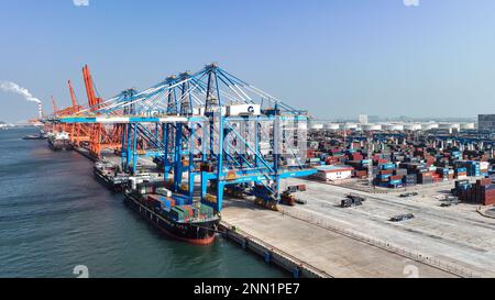 Qinzhou. 25th Feb, 2023. This aerial photo taken on Feb. 25, 2023 shows an automatic container terminal at Qinzhou Port in south China's Guangxi Zhuang Autonomous Region. As of Feb. 23 this year, the New International Land-Sea Trade Corridor saw 107,000 TEU containers transported by the rail-sea intermodal freight trains, up 9.25 percent year on year. Credit: Zhang Ailin/Xinhua/Alamy Live News Stock Photo