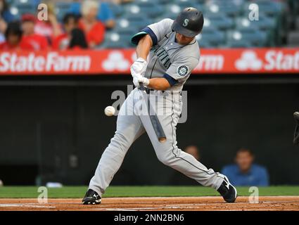 ANAHEIM, CA - JULY 16: Kyle Seager (15) celebrates with J.P.