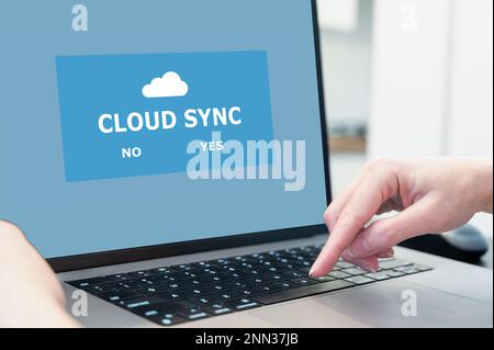 Upload, download or sync. Cloud service for storing files and online backup. Using modern wireless technologies. Stock Photo