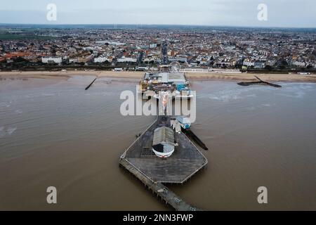 Aerial photo of Clacton Pier in Clacton-on-Sea. The town of Clacton-on-Sea is visible in the background. Stock Photo