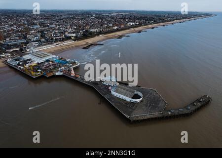 Aerial photo of Clacton Pier in Clacton-on-Sea. The town of Clacton-on-Sea is visible in the background. Stock Photo