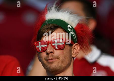 A Denmark team fan waits for the start of the Euro 2020 soccer championship quarterfinal match between Czech Republic and Denmark, at the Olympic stadium in Baku, Saturday, July 3, 2021. (Ozan Kose, Pool via AP)
