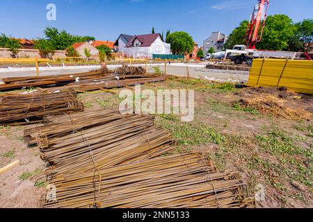 Tied bundles of steel bars reinforcement ready for installation ...