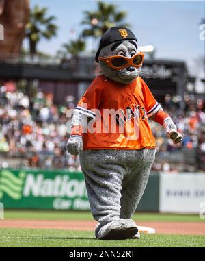 June 27 2021 San Francisco CA, U.S.A. Bay Area recording artist and  producer E-40 and San Francisco Giants mascot Lou Seal hanging with the  fans during the MLB game between the Oakland