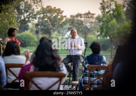 Delhi, India. 25th Feb, 2023. German Chancellor Olaf Scholz (SPD) joins Salma Umma Bava in a discussion with representatives of Indian society at the Sunder Nursery. Scholz is in India for a two-day visit. Credit: Michael Kappeler/dpa/Alamy Live News Stock Photo
