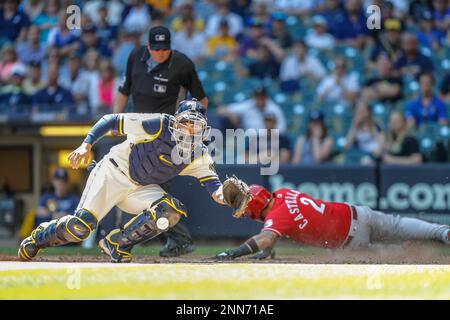 MILWAUKEE, WI - JUNE 16: Cincinnati Reds catcher Tucker Barnhart (16) hits  a triple and drives in a run during the third game of a three game series  between the Milwaukee Brewers