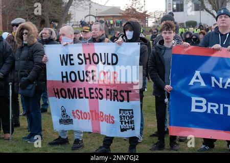 Tower Gardens, Skegness UK, 25th Feb 2023. Protesters march from the railway station to Tower Gardens demonstrating against the amount of asylum seekers being housed in five hotels in the seaside resort. Credit: Mark Lear / Alamy Live News Stock Photo
