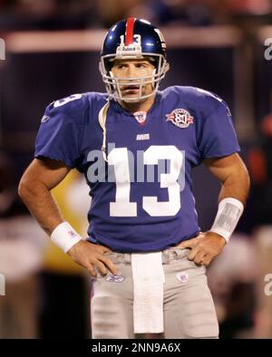 New York Giants quarterback Kurt Warner looks dejected while