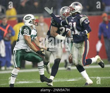 FOXBORO, MA - OCTOBER 24: Patriots #37 Rodney Harrison cheers after  breaking up a pass to Wayne Chrebet late in the fourth quarter with 8 yds  to go to pull ahead during