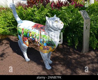 Dickson, Little Haiti cat, has painting of rural Haitian town on its side. Dogs and Cats Walkway and Sculpture Gardens in Maurice A. Ferre Park Stock Photo