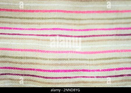 Thick linen fabric in horizon pink and brown stripes. Stock Photo
