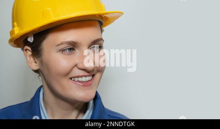 Portrait of a woman engineer in helmet Stock Photo
