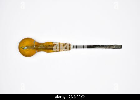 Close up of a dirty old screwdriver, isolated on a white background Stock Photo