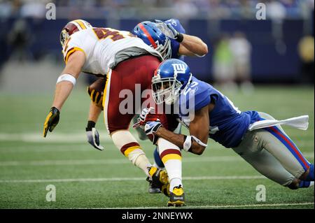 Washington Redskins Chris Cooley gets wrapped up by Dallas Cowboy Kevin  Burnett after a short gain November 18, 2007 at Texas Stadium in Irving,  TX. The Cowboys beat the Redskins 28-23. (UPI