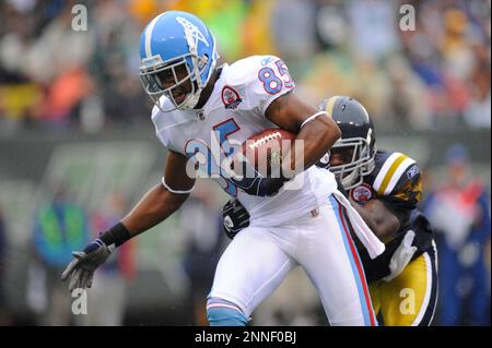 27 September 2009: Tennessee Titans running back #28 Chris Johnson pulls  out. The New York Jets defeated the Tennessee Titans 24-17 at Giants  Stadium in Rutherford, New Jersey. In honor of AFL