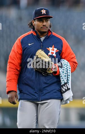 DENVER, CO - APRIL 20: Houston Astros starting pitcher Luis Garcia (77)  pitches during a game between the Colorado Rockies and the Houston Astros  at Coors Field in Denver, Colorado on April