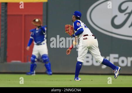 Atlanta Braves bullpen catcher Jimmy Leo (97) warms up before a