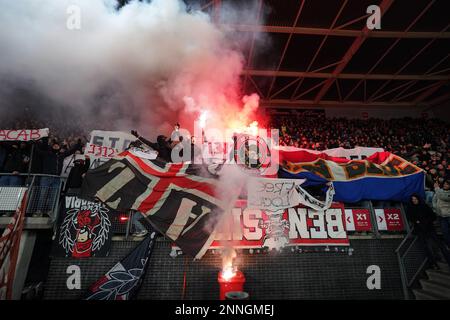 ALKMAAR - AZ supporters set off fireworks during the Dutch premier league match between AZ Alkmaar and SC Cambuur at the AFAS stadium on February 25, 2023 in Alkmaar, Netherlands. ANP ED VAN DE POL Stock Photo