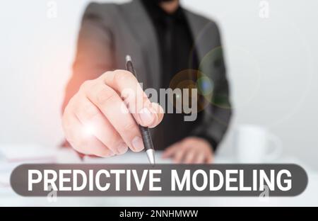 Text caption presenting Predictive Modeling. Business approach maintenance strategy driven by predictive analytics Stock Photo