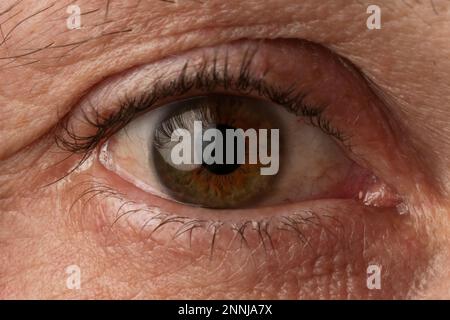Close up image of aged man's eye, looking at camera Stock Photo