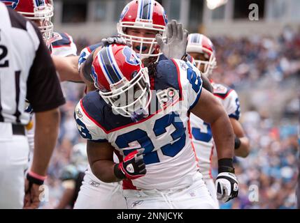 25 October 2009: Bills running back Marshawn Lynch (23) points to teammates  while celebrating the first touchdown of the game during the first quarter  of the Buffalo Bills 20-9 victory over the