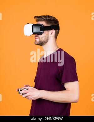 Testing new technologies. man with glasses of virtual reality. Future technology. guy getting experience using VR-headset glasses. man in virtual Stock Photo