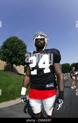 30 July 2009: Wide Reciever Terrell Owens of the Buffalo Bills unveils the  new throwback uniforms after the Bills Thursday night practice at St. John  Fisher College in Pittsford, New York. (Icon