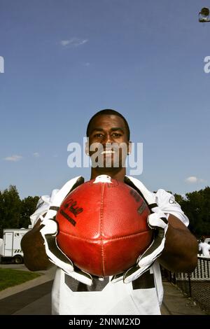 30 July 2009: Wide Reciever Terrell Owens of the Buffalo Bills unveils the  new throwback uniforms after the Bills Thursday night practice at St. John  Fisher College in Pittsford, New York. (Icon