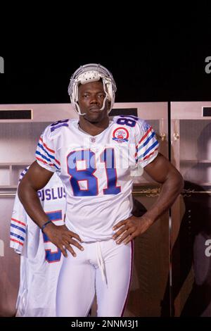 30 July 2009: Wide Reciever Terrell Owens of the Buffalo Bills unveils the  new throwback uniforms after the Bills Thursday night practice at St. John  Fisher College in Pittsford, New York. (Icon