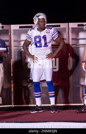 30 July 2009: Wide Reciever Terrell Owens of the Buffalo Bills unveils the  new throwback uniforms after the Bills Thursday night practice at St. John  Fisher College in Pittsford, New York. (Icon