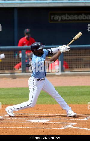 Port Charlotte, FL USA: Tampa Bay Rays starting pitcher Shane McClanahan  (18) was watching the game during a spring training baseball game against  the Boston Red Sox, Tuesday, March 22, 2022, at