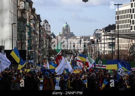 Brussels, Brussels Capital Region, Belgium. 25th Feb, 2023. People hold signs, Ukrainian and Belarusian flags, and flags of the Chechen Republic of Ichkeria during a demonstration in occasion of the one-year anniversary of Russia's invasion of Ukraine in Brussels, Belgium, February 25, 2023. (Credit Image: © Valeria Mongelli/ZUMA Press Wire) EDITORIAL USAGE ONLY! Not for Commercial USAGE! Credit: ZUMA Press, Inc./Alamy Live News Stock Photo