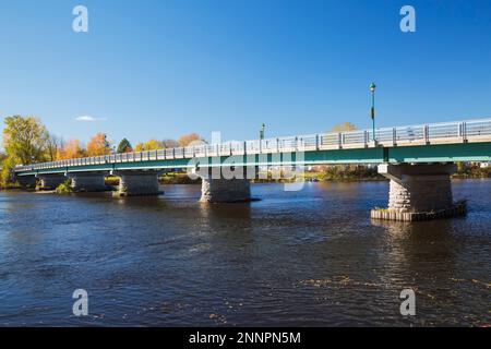 Bridge over Sainte-Anne River in autumn, Ste-Anne-de-la-Perade, Mauricie, Quebec, Canada. Stock Photo