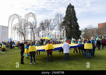 Seattle, Washington, USA. 25th February, 2023. Seattle Center is awash with Ukrainian flags as hundreds of supporters gather to mark the the first anniversary of the Russian invasion of Ukraine. The “365 Days of Defending Freedom” rally was organized by the Ukrainian Association of Washington State and the Ukrainian Orthodox Church Seattle. Credit: Paul Christian Gordon/Alamy Live News Stock Photo