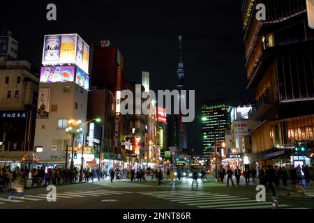 Street scene in the district Asakusa, in the background the Skytree, with 634 meters the highest television tower of the earth, Tokyo, Japan Stock Photo